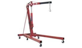 Heavy-duty engine hoist featuring a hydraulic lift, adjustable arm, and sturdy wheels for easy mobility in workshops.