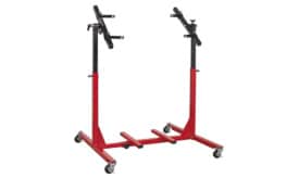 Adjustable red engine stand with wheels and support arms for engine maintenance and repair tasks.