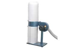 Industrial dust collector machine with a large filter bag and motor for efficient dust extraction in workshops.