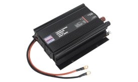 Sealey 1000W power inverter with black casing and connection cables, suitable for converting DC to AC power.